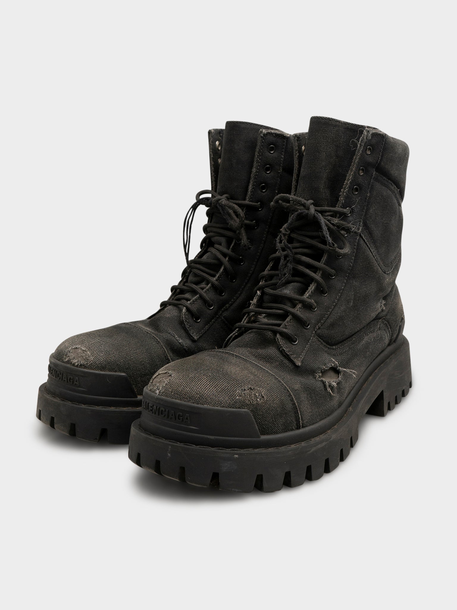 Balenciaga: Distressed Strike Boots | Groupie