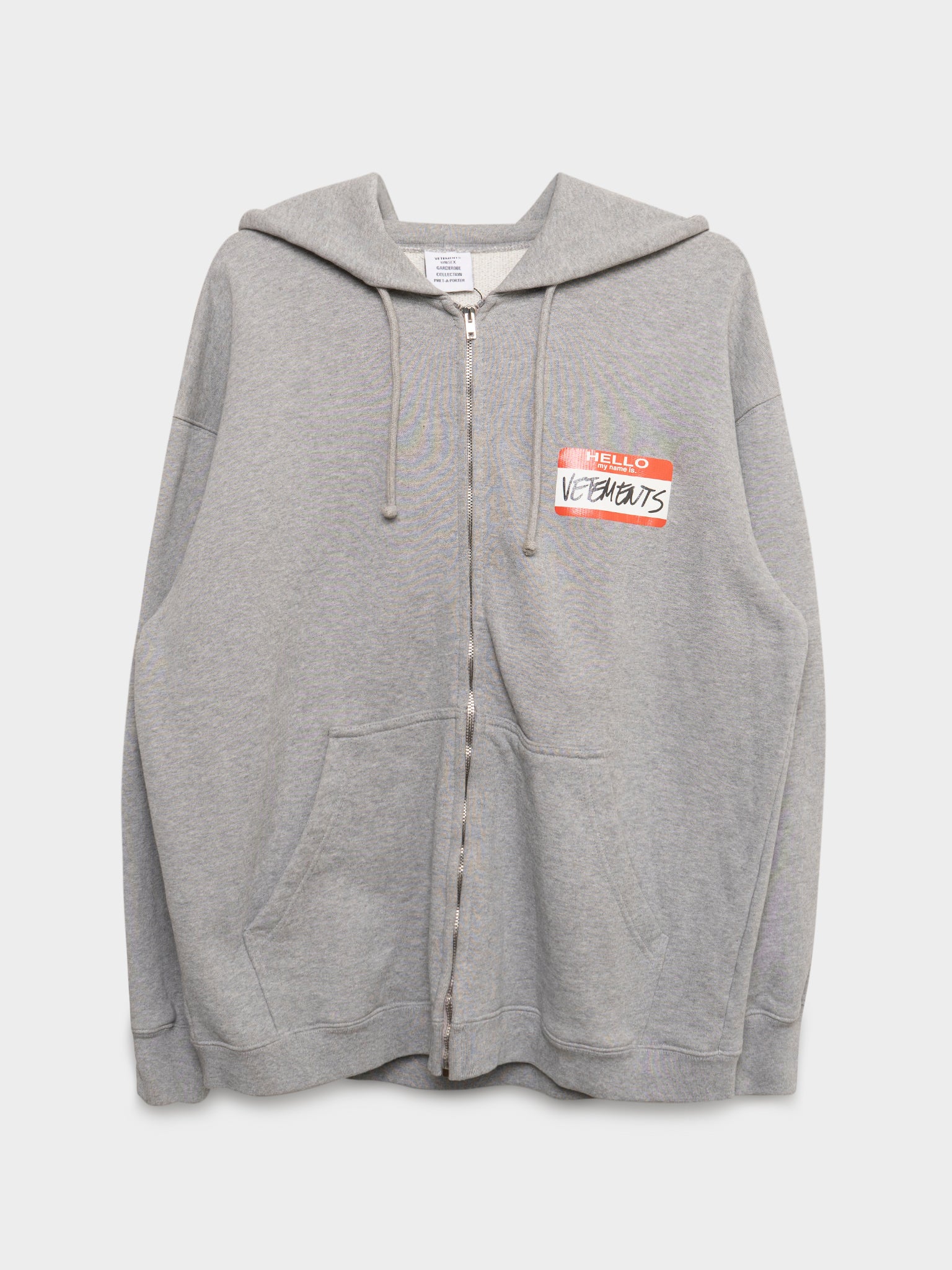 Vetements: Nametag “Hello, My Name Is” Zip-Up Hoodie | Groupie